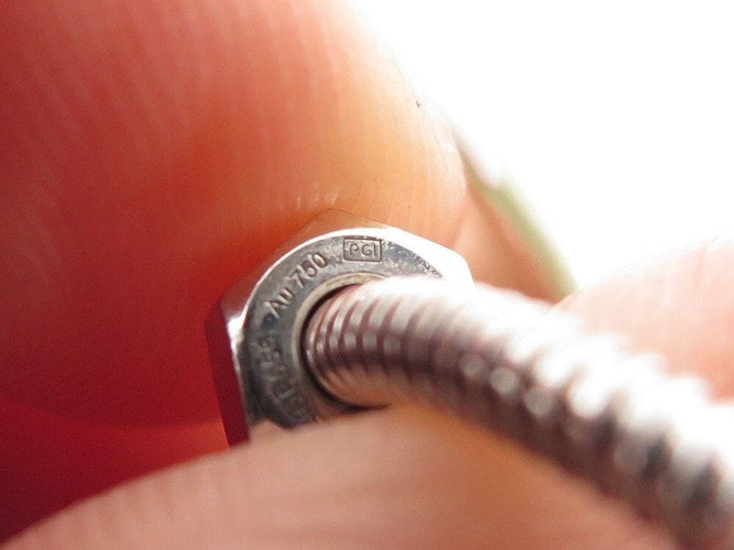 Bague 54 bague CARTIER ecrou en or blanc 58 Facettes 258780