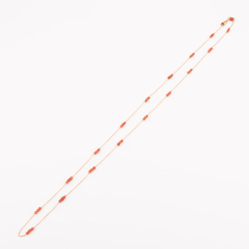 Collier Sautoir en or jaune et  boules de corail facettés 58 Facettes