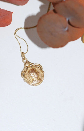 Pendentif Médaille pivotante pièce romaine or 58 Facettes