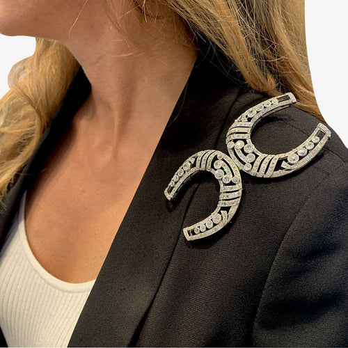 Broche Broche "Fers à Cheval" en platine et diamants. 58 Facettes 31655