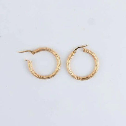 Boucles d'oreilles Créoles torsadées 58 Facettes