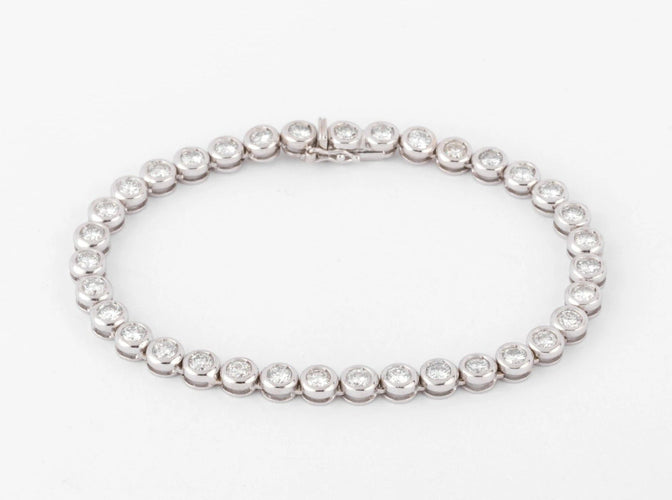 Bracelet Bracelet en or gris et diamants tennis serti tennis 58 Facettes 1