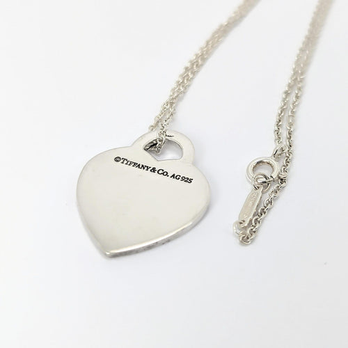 Pendentif TIFFANY & CO - Pendentif  "Please return to" argent 58 Facettes 25394