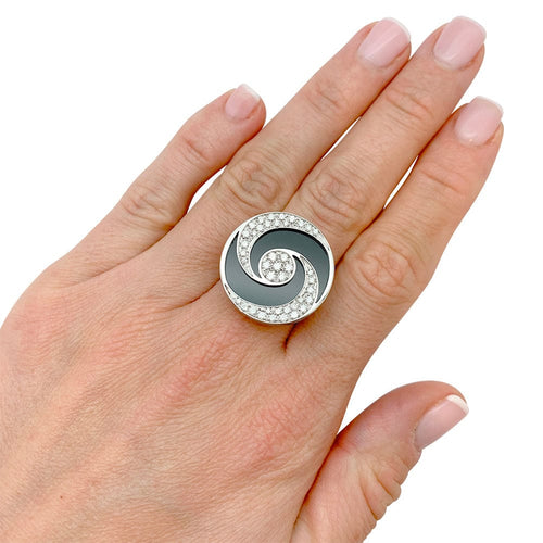 Bague 53 Bague Bulgari "Hypnotique" plateau tournant or blanc et acier, onyx et diamants. 58 Facettes 31216