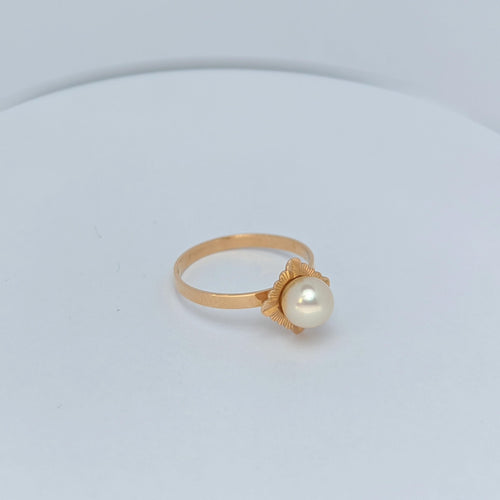 Bague Bague en or jaune et perle 58 Facettes 16110