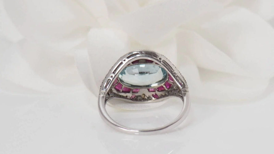 Bague Bague Art Déco or blanc et argent, aigue marine, rubis et diamants 58 Facettes 31442