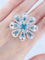Bague 53 Bague fleur diamants, topazes, or blanc 58 Facettes