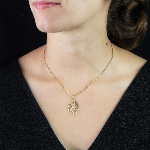 Pendentif Pendentif main de Fatma or perles et pierre turquoise 58 Facettes 18-008A
