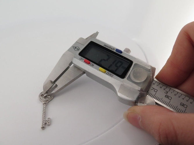 Collier collier pendentif TIFFANY & CO cle rosace platine diamants 58 Facettes 248507