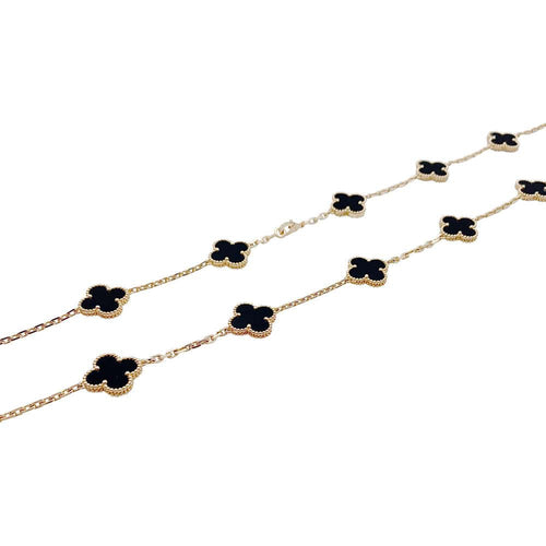 Collier Sautoir Van Cleef & Arpels, "Vintage Alhambra", or jaune, onyx. 58 Facettes 32128