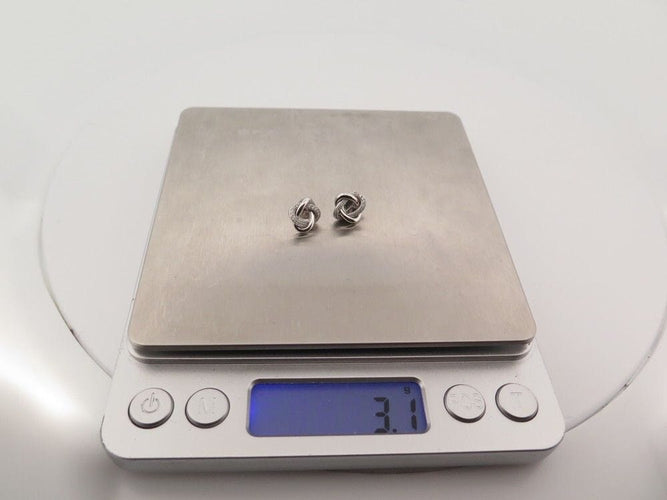 Boucles d'oreilles POIRAY - Puces d'oreilles tresse Or Diamants 58 Facettes 255372