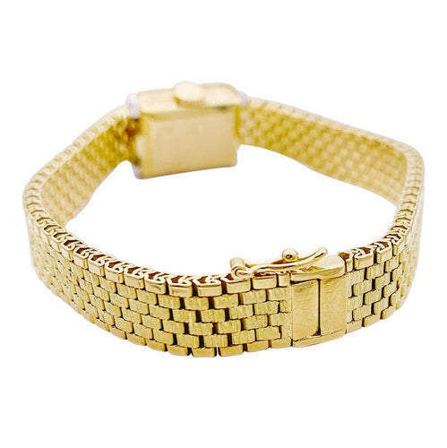 Montre Montre vintage André Col, or jaune, platine, diamants. 58 Facettes 33020