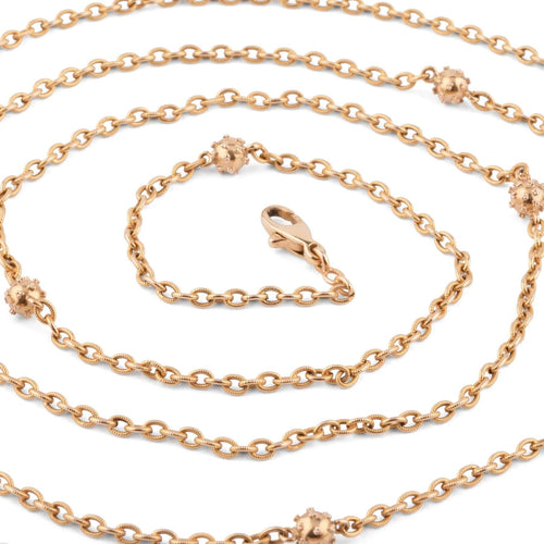 Collier Sautoir ancien en or jaune orné de petites boules 58 Facettes 1