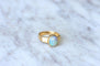 Bague Bague or et opale cabochon 58 Facettes
