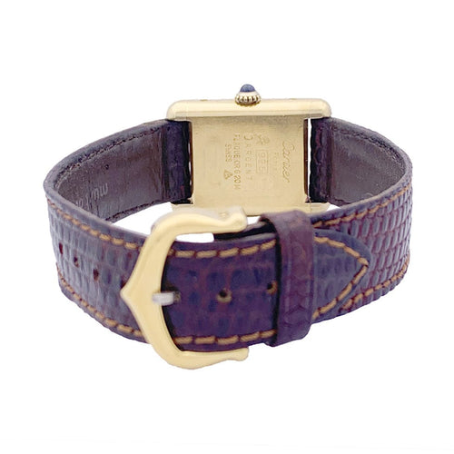 Montre Montre Cartier "Tank Must" argent plaqué or, cadran laqué rouge. 58 Facettes 33540