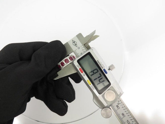 Bague 56 bague en or jaune 18k t56 pavage de 42 diamants 0.63ct & 5 rubis 2.5ct 58 Facettes 251212