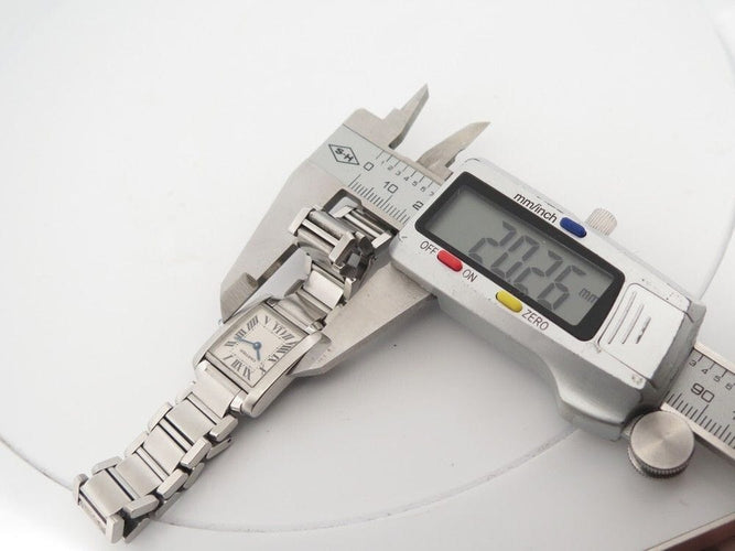 Montre montre CARTIER tank francaise pm acier quartz + etui lady 58 Facettes 255322