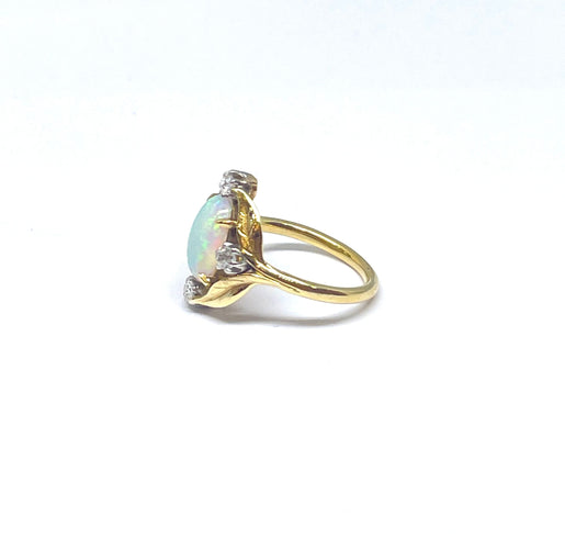 Bague Bague opale et diamants monture en or jaune 18 carats 58 Facettes