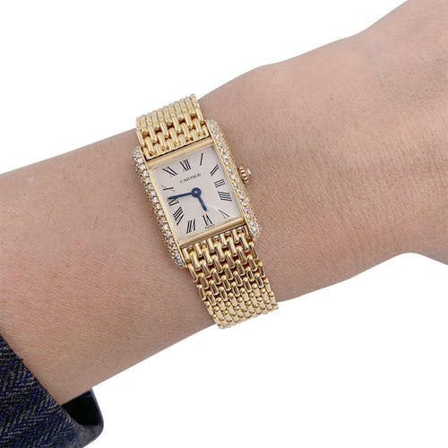 Montre Montre Cartier Tank Louis Cartier, or jaune et diamants. 58 Facettes 32195
