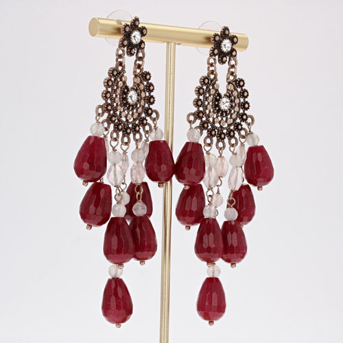 Boucles d'oreilles Boucles d'oreilles chandelier cristaux et rubis 58 Facettes 16-047