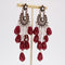 Boucles d'oreilles Boucles d'oreilles chandelier cristaux et rubis 58 Facettes 16-047