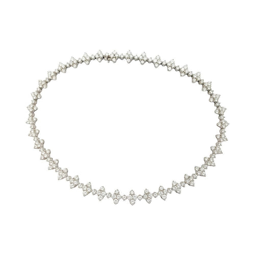 Collier Collier fleurettes en or blanc et diamants. 58 Facettes 31829