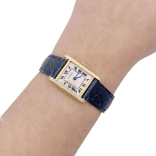 Montre Montre Cartier, "Tank Louis Cartier", or jaune et diamants. 58 Facettes 33338