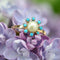 Bague 54 Bague or rose perle de culture et perles de turquoise 58 Facettes 19-635