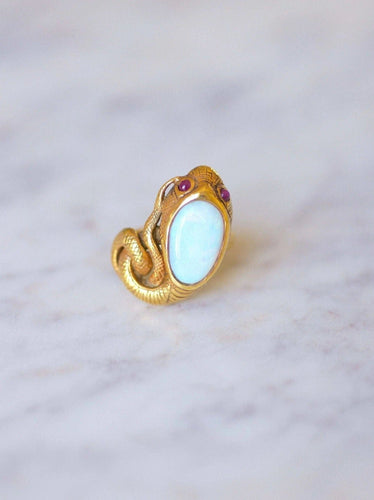 Bague serpent enroulé vintage en or jaune, opale, et rubis 58 Facettes