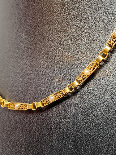 Collier Collier en or, perles fines 58 Facettes