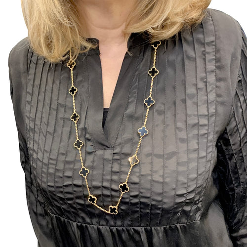 Collier Sautoir Van Cleef & Arpels, "Vintage Alhambra", or jaune, onyx. 58 Facettes 32128