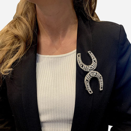 Broche Broche "Fers à Cheval" en platine et diamants. 58 Facettes 31655