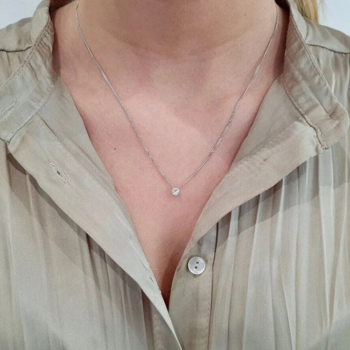 Collier Collier solitaire or blanc diamant 58 Facettes