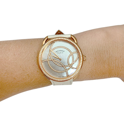 Montre Montre Hermès "Arceau", or rose, diamants et cuir. 58 Facettes 31677