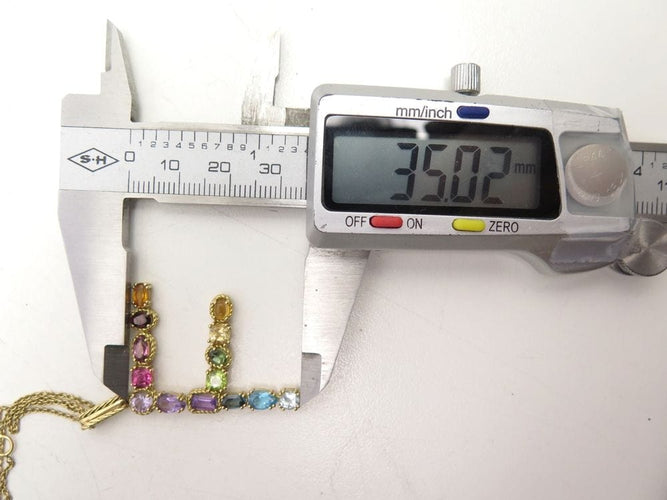 Collier collier pendentif DOLCE & GABBANA breloque f rainbow t50 or jaune 58 Facettes 250337