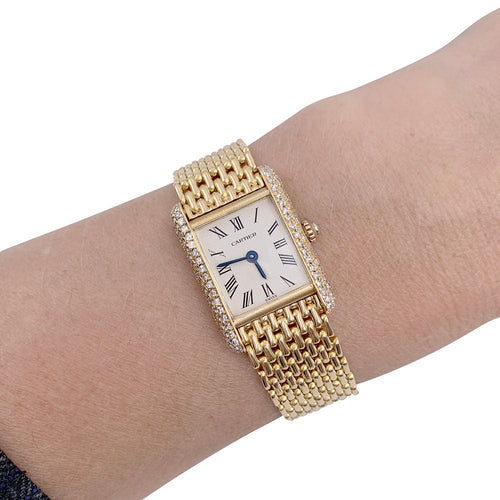 Montre Montre Cartier Tank Louis Cartier, or jaune et diamants. 58 Facettes 32195
