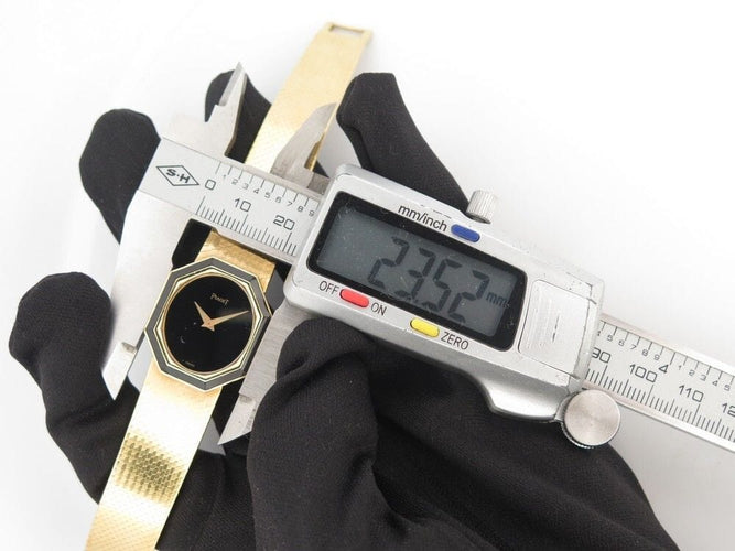Montre vintage montre PIAGET octogonal onyx 26mm or jaune 18k mecanique 58 Facettes 254507