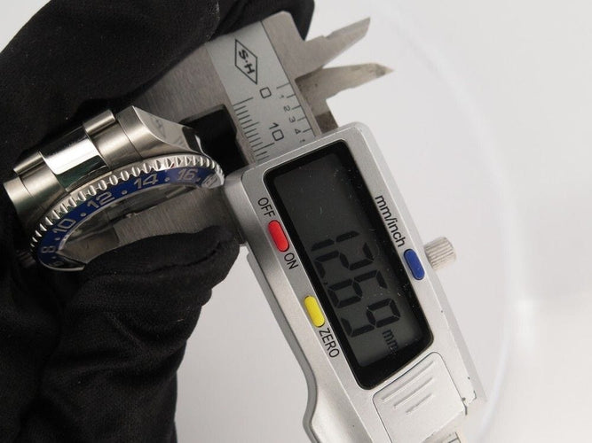 Montre montre ROLEX batman gmt-master ii oyster perpetual automatique 40 mm 58 Facettes 256322