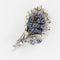 Broche Broche bouquet saphirs diamants 58 Facettes 19-564