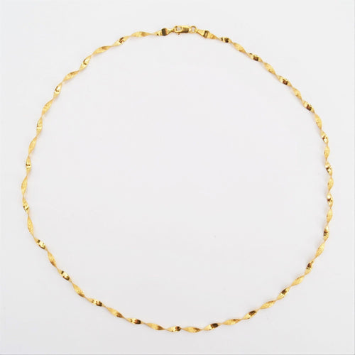 Collier Chaine en or fil plat torsadé 58 Facettes CVCH8