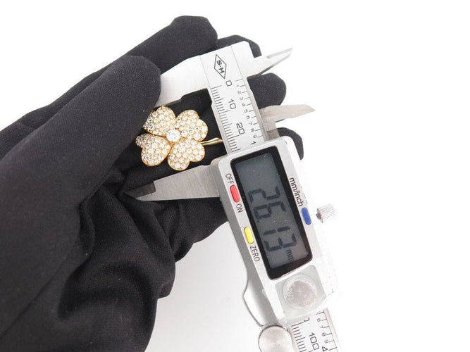 Broche vintage broche VAN CLEEF & ARPELS cosmos or jaune 18k diamants 3.65ct 58 Facettes 250924