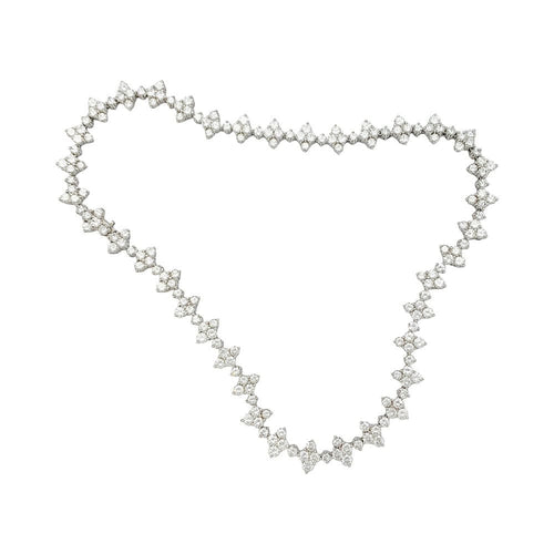 Collier Collier fleurettes en or blanc et diamants. 58 Facettes 31829