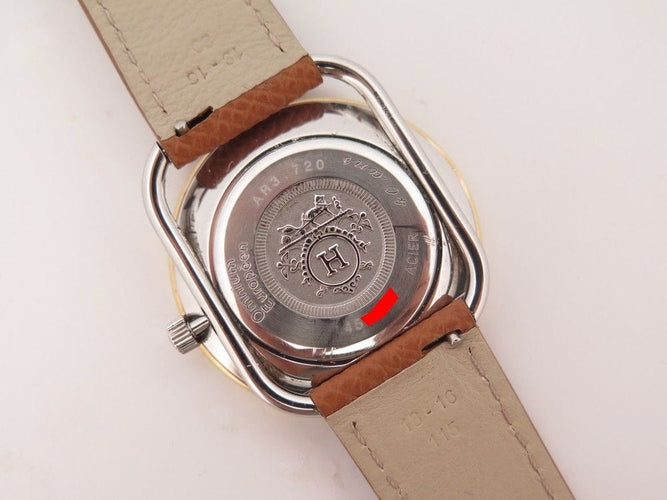 Montre montre HERMES arceau quartz 33 mm or & acier 58 Facettes 254345