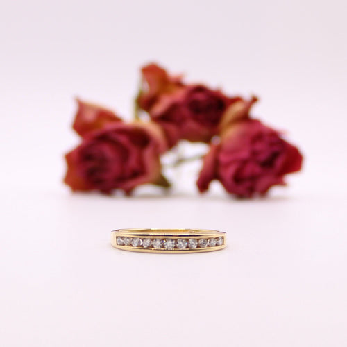 Bague Alliance demi-tour or jaune et diamants serti rail 58 Facettes