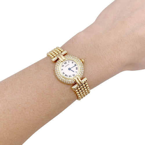 Montre Montre Cartier "Colisée", or jaune et diamants. 58 Facettes 33290