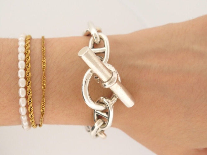 Bracelet vintage bracelet HERMES chaine ancre t19 13 maillons argent massif 58 Facettes 254651