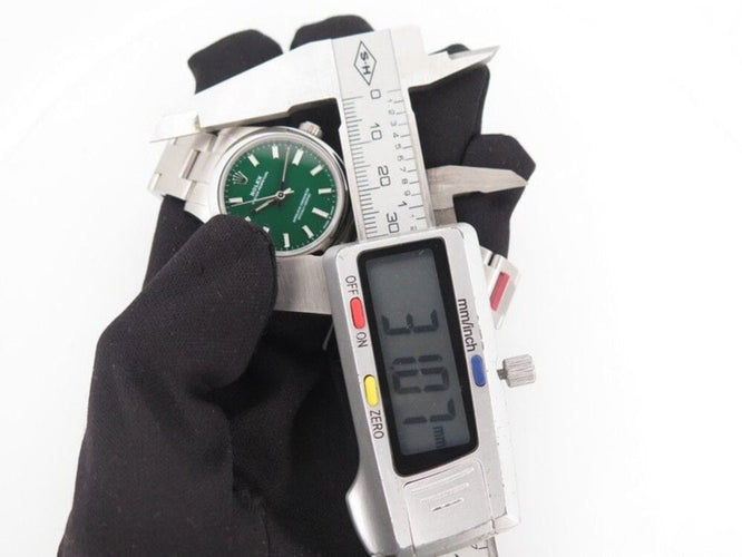 Montre montre ROLEX oyster perpetual 31 mm automatique acier 58 Facettes 257401