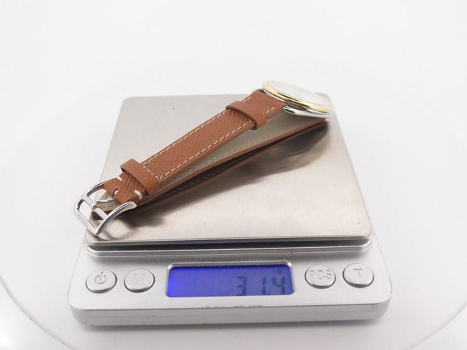 Montre montre HERMES arceau quartz 33 mm or & acier 58 Facettes 254345