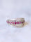 Bague Bague bandeau vintage en or gris, rubis, et diamants 58 Facettes