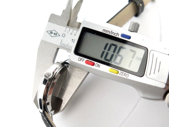 Montre vintage montre LEMANIA two tone 35 mm mecanique acier palladier 58 Facettes 250830